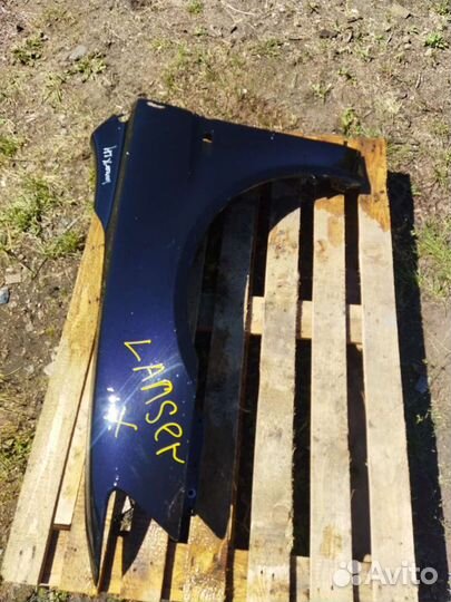 Крыло левое Mitsubishi Lancer X ремонт