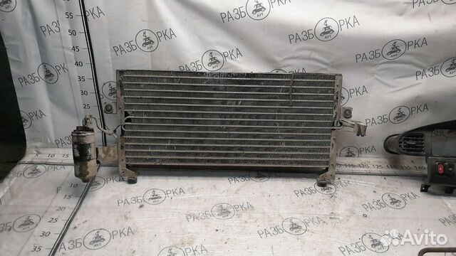 Радиатор кондиционера Nissan Avenir W10 cd20td