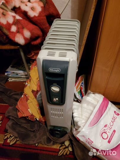 Масляный обогреватель delonghi