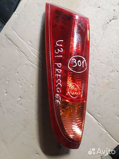 Задний фонарь Nissan Presage U31 левый