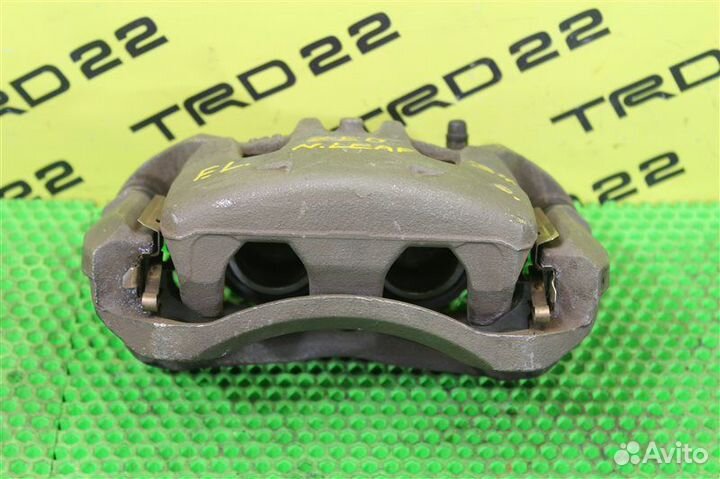 Суппорт тормозной передний левый Nissan Leaf ZE0