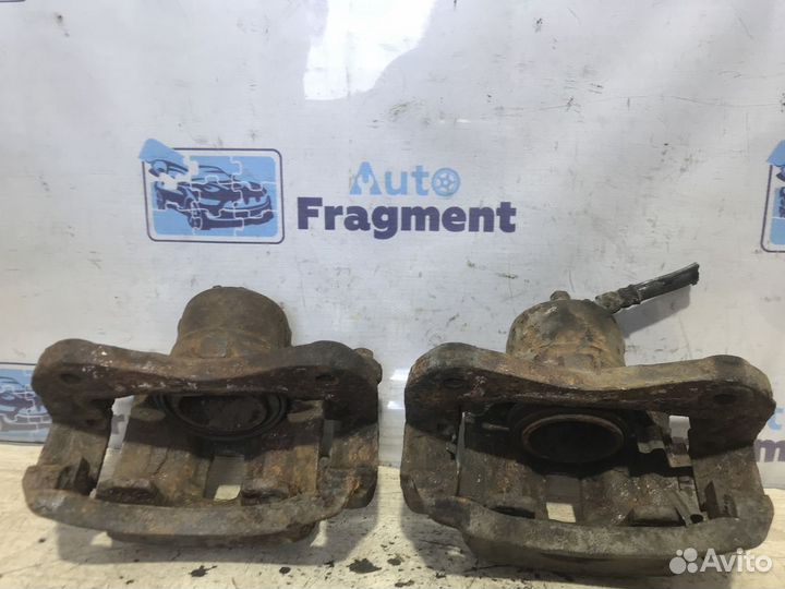 Суппорт тормозной передний Hyundai Elantra (J2)