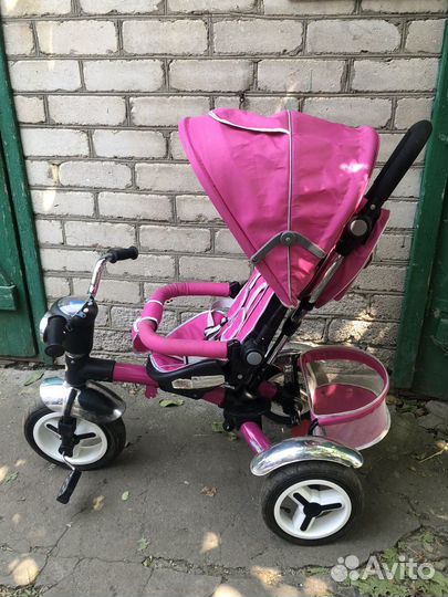 Трехколесный велосипед с ручкой