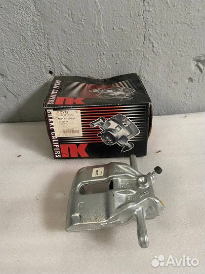 Суппорт тормозной передний правый Nissan Note E11