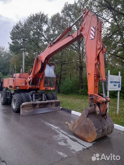Услуги экскаватора полноповоротного колёсного