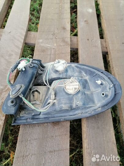 Фонарь задний левый Mazda 323 BA