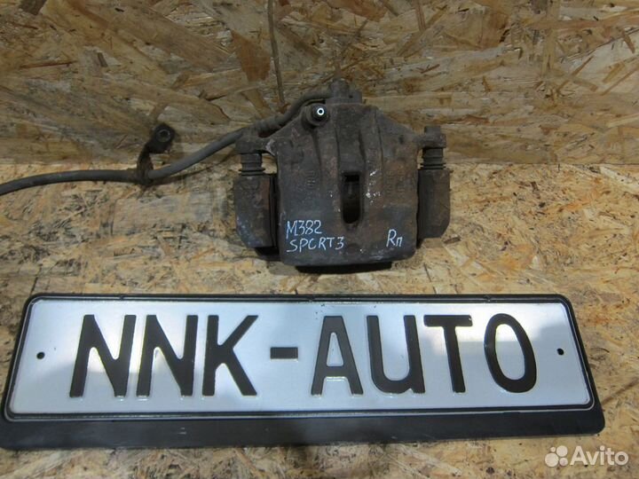 Суппорт тормозной передний Kia Sportage 3