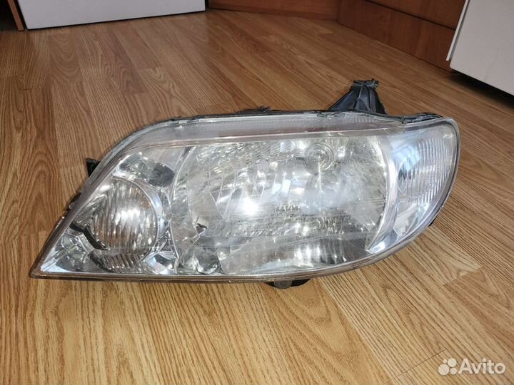 Фары передние Mazda Familia/Protege/323