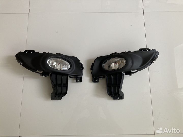 Фара противотуманная + оправа (1шт) Mazda 3 BK