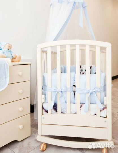 Детская кроватка колесо-качалка