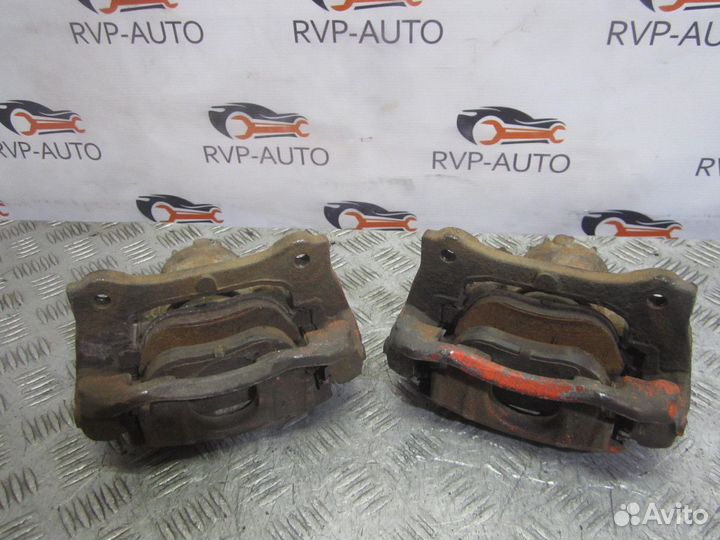 Суппорт тормозной передний Geely Emgrand EC7 09-17