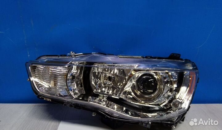 Фара левая Mitsubishi Outlander 2 XL (2007-2012)