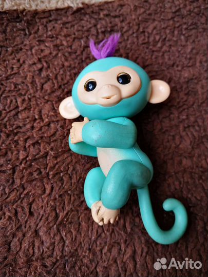 Игрушка обезьянка говорящая
