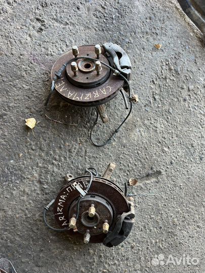 Кулак поворотный передний Mitsubishi Carisma