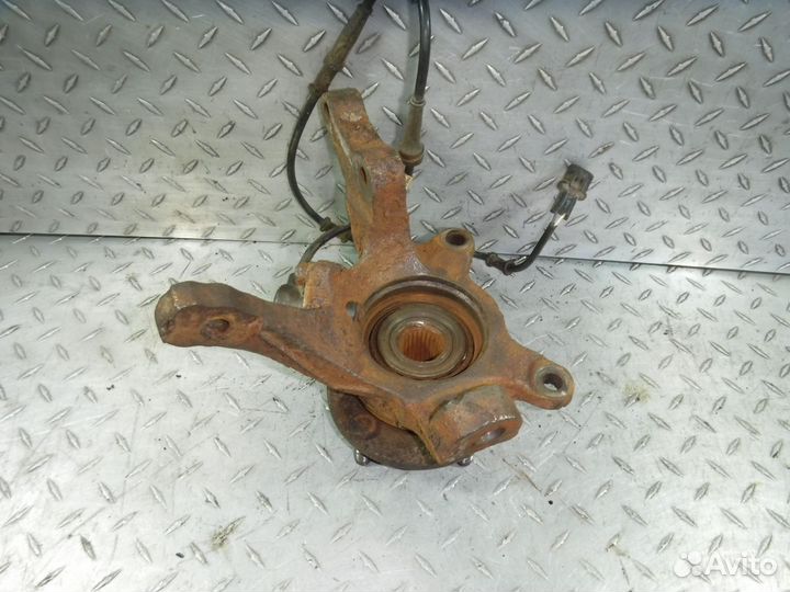 Кулак поворотный передний левый Mitsubishi Lancer