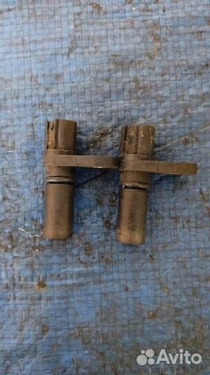 Датчик положения распредвала Lincoln Navigator J2J