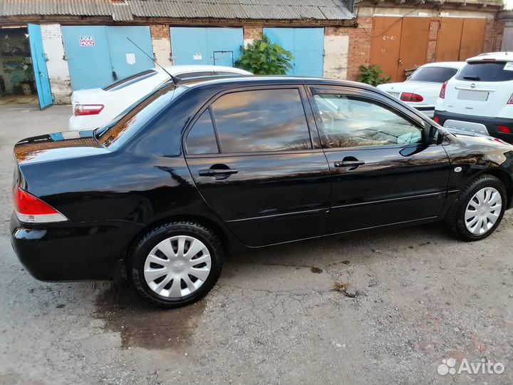 Mitsubishi Lancer 1.3 МТ, 2005, 185 000 км