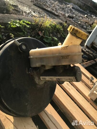 Вакуумник с гтц в сборе Dodge Caravan 4 2.4