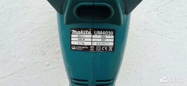 Триммер электрический makita