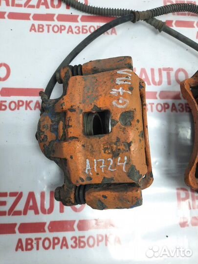 Суппорт тормозной передний левый Mitsubishi Galant