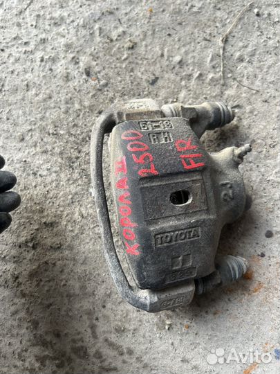 Суппорт передний правый corolla 2