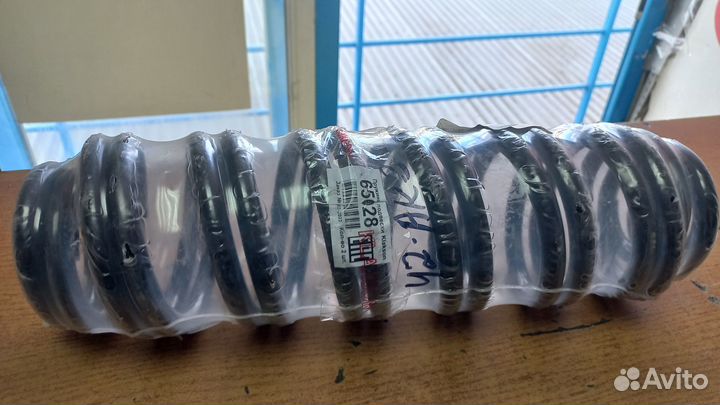 Пружина задняя