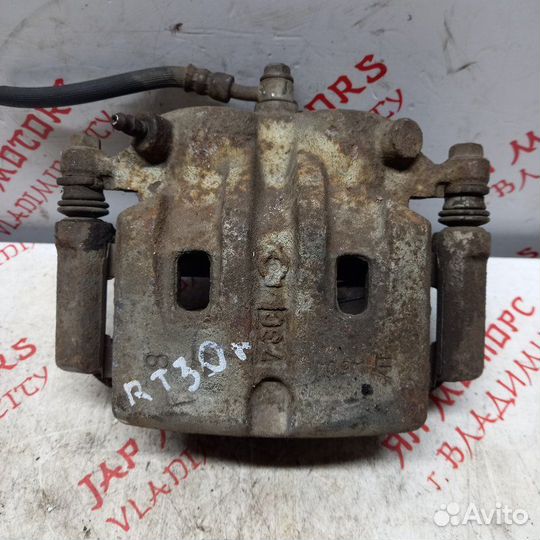 Суппорт тормозной передний правый Nissan X Trail