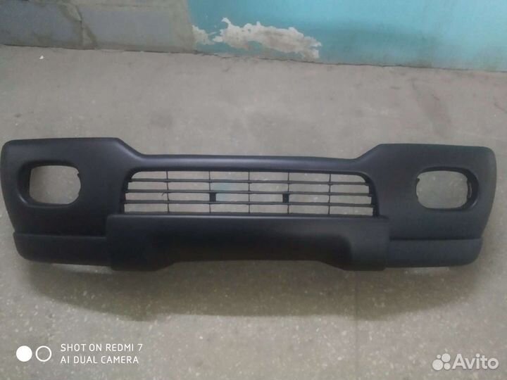 Бампер Митсубиси Паджеро Спорт 00-08 г.в