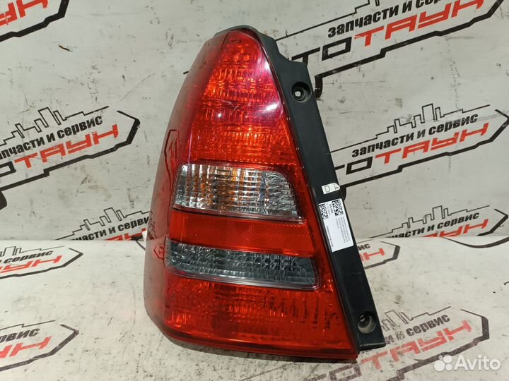 Фонарь subaru forester SG5 SG9 22020759 1 модель левый 84201SA010 FA341