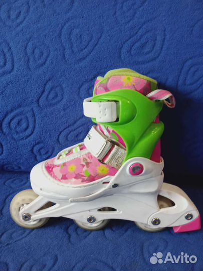 Роликовые коньки