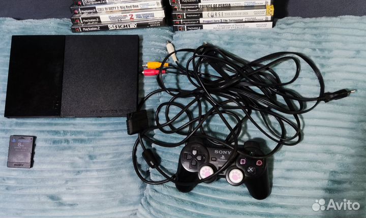 Sony PlayStation 2 slim и 34 диска с играми