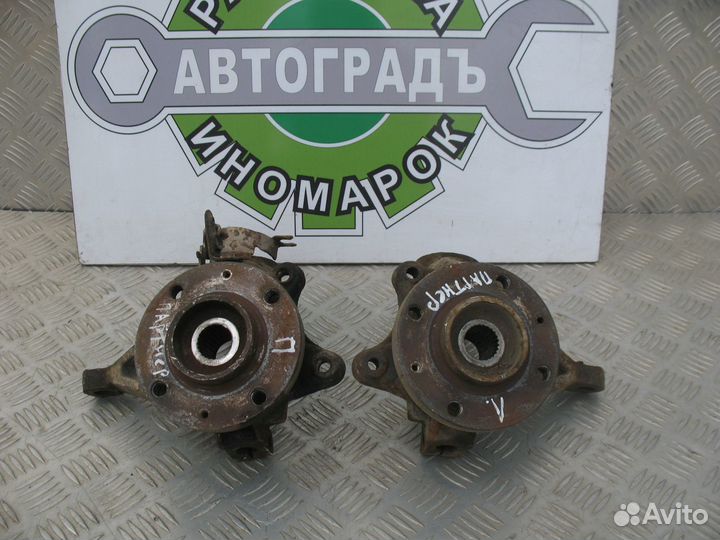 Кулак поворотный левый Peugeot Partner M49 1.4