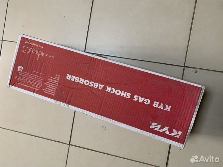 Амортизатор передний правый Nissan Micra K12