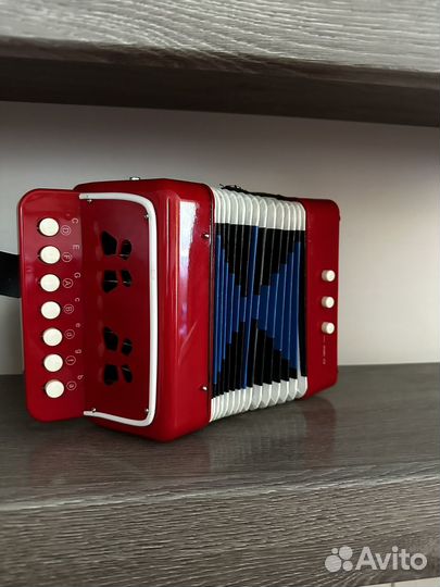 Музыкальная игрушка гармошка