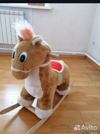 Конь качалка