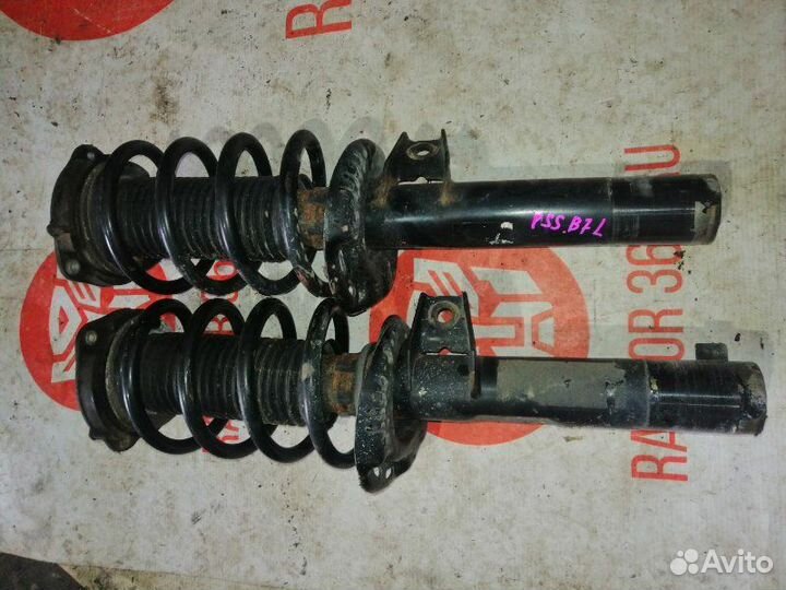 Амортизатор передний Volkswagen Passat Alltrack B7