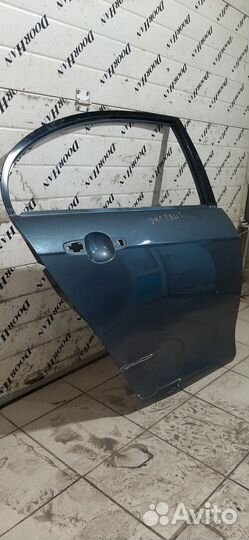 Задняя правая дверь эмгранд ес7 седан