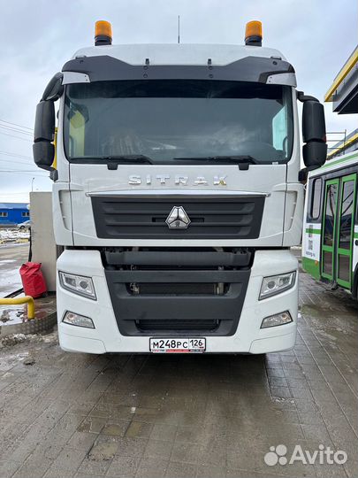 Водитель седельного тягача с категорией Е