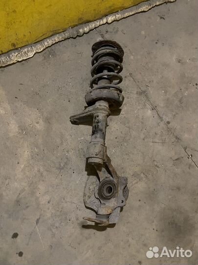 Стойка передняя левая Киа Шума/Нексия