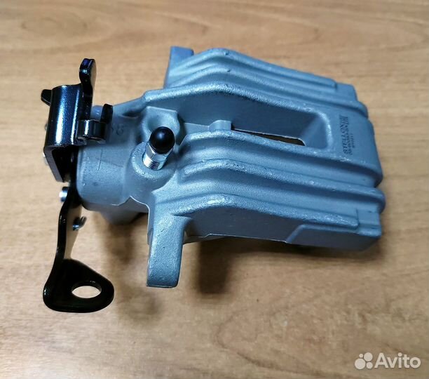 Суппорт задний левый VW Passat B5 / Audi A4 (новый