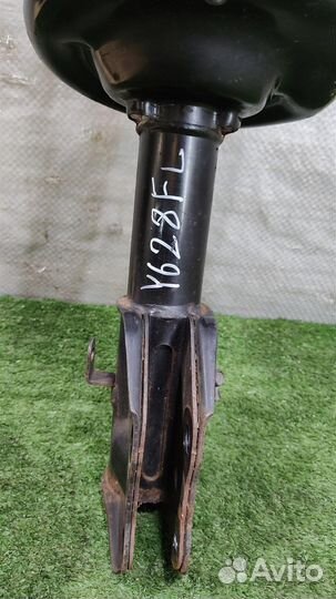 Стойка амортизатора передняя левая Subaru Foreste