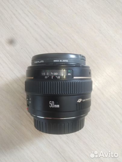 Объектив Canon 50 mm f 1.4