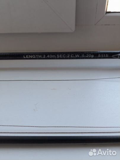 Спиннинг с катушкой и приманкой