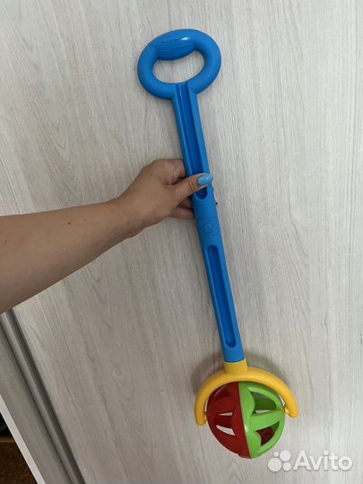 Игрушка каталка с ручкой