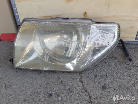 Фара передняя левая Pajero IO 2001
