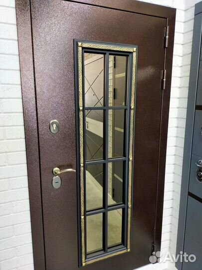 Дверь металлическая с ковкой