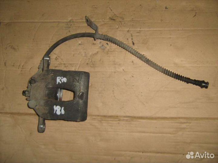 Суппорт передний левый KIA RIO 2012