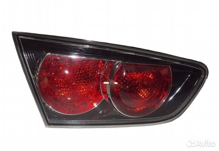 Фонарь задний внутренний левый Lancer X