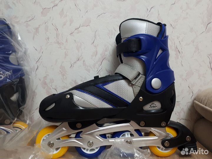 Роликовые коньки