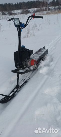 Мотосноуборд